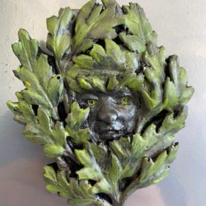 Green Man tiny relief sculpture by Yvonne Desrosiers